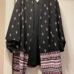 Black jacket with red and white details